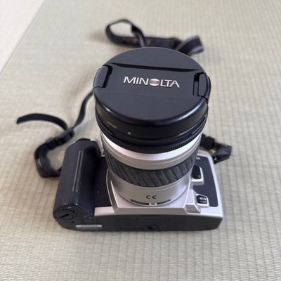 Minolta SRT film SLR camera 35-80mm lens, used, with wear and scratches
