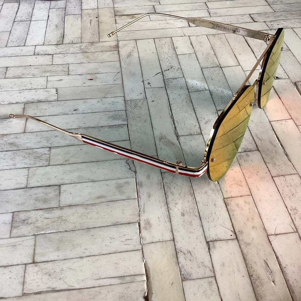 Gafas de sol unisex a rayas plateadas reflectantes Thom Browne New York Foto 2 de 4