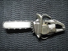 CHAINSAW CUT OUT BELT BUCKLE! VINTAGE! RARE! BERGAMOT BRASS WORKS! 1978! USA!