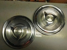 Two 1960s 1961 1962 1963 Pontiac Catalina Spinner Hubcaps
