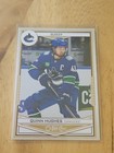 2024-25 UD OPC GLOSSY GOLD - Quinn Hughes #OG-18 Vancouver Canucks
