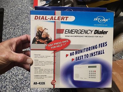 Skylink AD-433S Total Protection Alarm System Manual - Emergency Dialer Alert