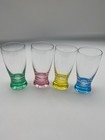Set of four Royal Danube shot glasses with solid colored bases. — photo 1
