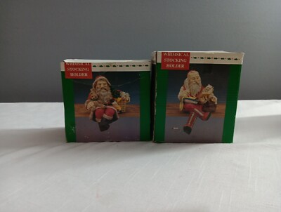 Two Christmas Santa Whimsical Stocking Holders