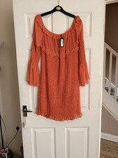 Orange Dress With Flowing Sleeves Elasticated On Front And Bottom Dress