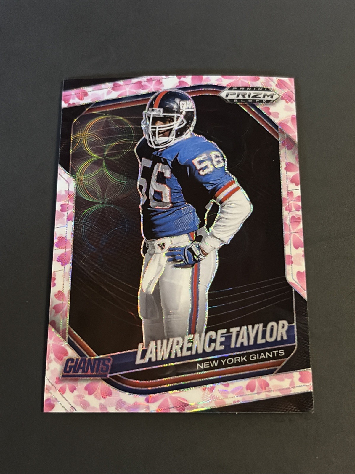 2025 Panini Prizm Black #100 Lawrence Taylor Cherry Blossom/20 NY Giants
