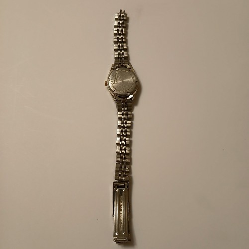 Vtg Pulsar Women’s Gold Silver Tone Date Indicator Quartz Watch V783-0030 Broken - Picture 5 of 14