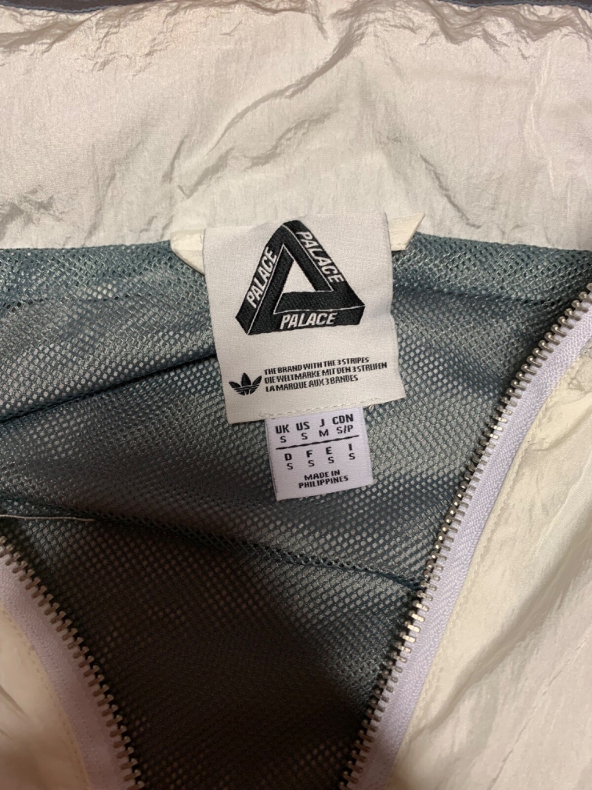 palace x adidas track top