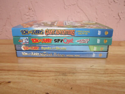 4 Tom and Jerry animated dvd movies for sale by owner!!!