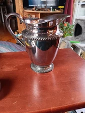 vtg silverplate water pitcher. 1123