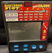RADIO SHACK ELECTRONIC SLOT WIN 10,000. Gently- Used, Normal Wear. FREE SHIPPING