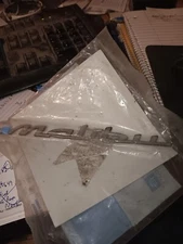 NOS 1997-2003 MALIBU TRUNK LID NAMEPLATE 22638462