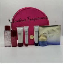 SHISEIDO HOT PINK ZIP AROUND POUCH COMED WITH 7 Products ( READ DESCRIPTION)