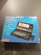 1991 Casio DIGITAL DIARY SF-9000 con Scatola + Libretto + Carica NUOVO MAI USATO