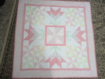 Handmade Pink Baby Quilt. 
