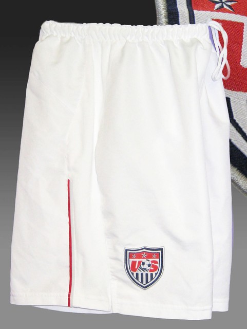 white nike football shorts