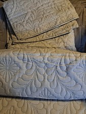 gray queen size quilt and 2 shams