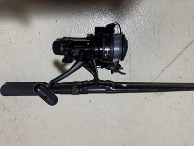old shimano rods Compre Lite Spinning wrapped carbon tape forming X shapes on the rod blanks outermost layer Shimano SLX Spinning Rod -
