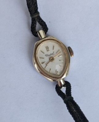 Women's vintage Montreal Swiss made braided band steel back wristwatch