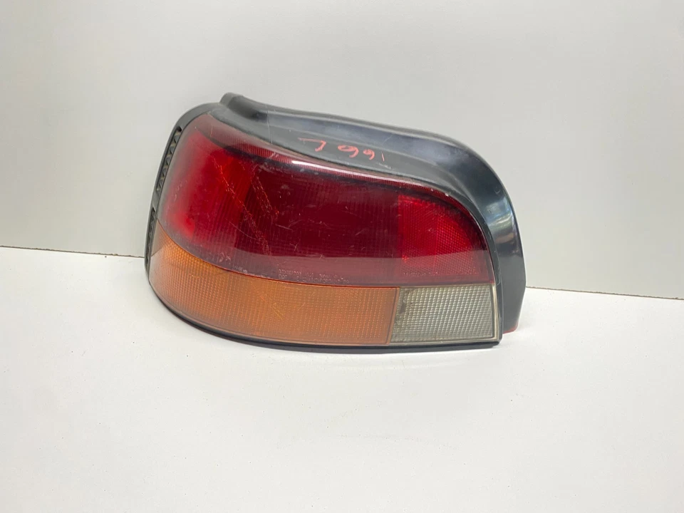 1991 - 1992 GEO STORM REAR LEFT DRIVER SIDE TAIL LIGHT LAMP OEM, 166-58516 - Image 3 of 4