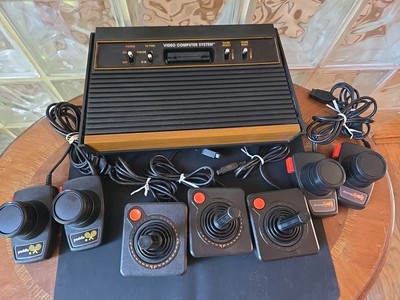 Vintage ATARI 2600 Console -Joysticks,Paddles,Driving Controllers Untested 
