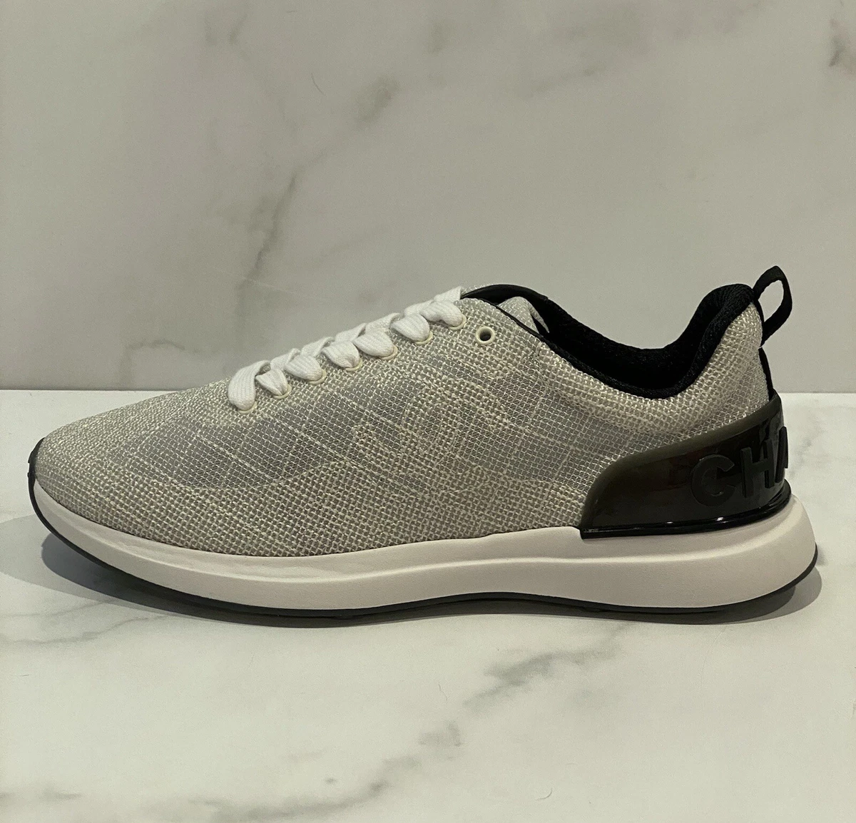 Chanel store grey trainers