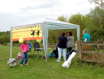 Photo 6x4 Draycote Water - charity fundraising booth Kites Hardwick A fun c2009
