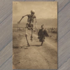 POSTCARD Boy Running Skeleton Dirt Road Creepy Funny Halloween Retro Humor