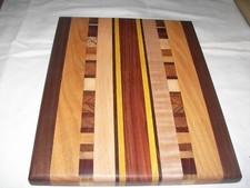 Small exotic wood cutting board 100 4888