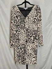 Two Jennifer Lopez mid length cocktail dresses size large