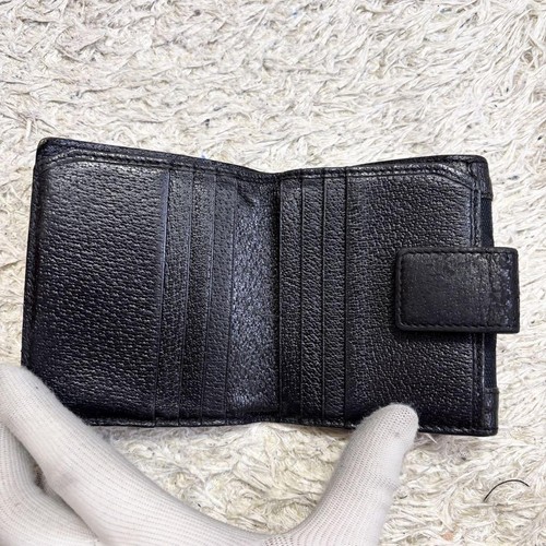 Gucci bi-fold wallet in black GG canvas with studs Authentic - Picture 6 of 10