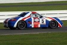 PHOTO  BRSCC SILVERSTONE NICK HULL MAZDA MX-5 RUSHES THROUGH THE LINK IN HIS PAT