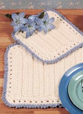 Crochet pattern copy 4312.    Place mats & pot holder.  Aran