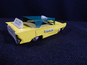 yellow taxi toy car