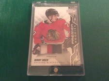 2019-20 Upper Deck Premier Rookies Premium Patch Kirby Dach /49 #94 Chicago