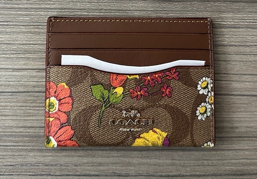 NWT Coach Slim ID Card Case In Signature Canvas With Floral NWT Coach Slim ID Card Case In Signature Canvas With Floral