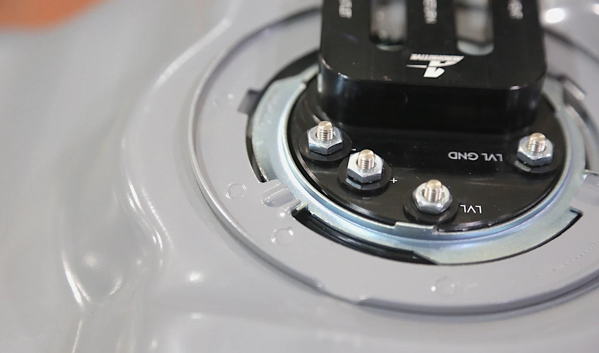 Reinstall the retainer ring (or bolts) before reinstalling the fuel tank into the vehicle.