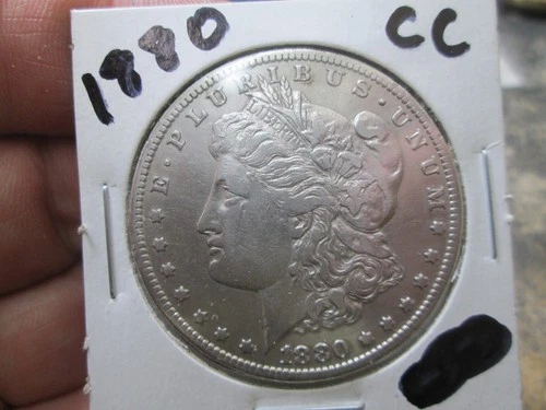 US 1880 CC MORGAN DOLLAR COIN IN EXTRA FINE CONDITION CLEANED