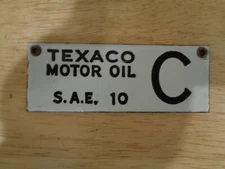 TEXACO OIL COMPANY MOTOR OIL PORCELAIN TANK TAG C S.A.E. 10 4" X 1-1/2" ORIGINAL