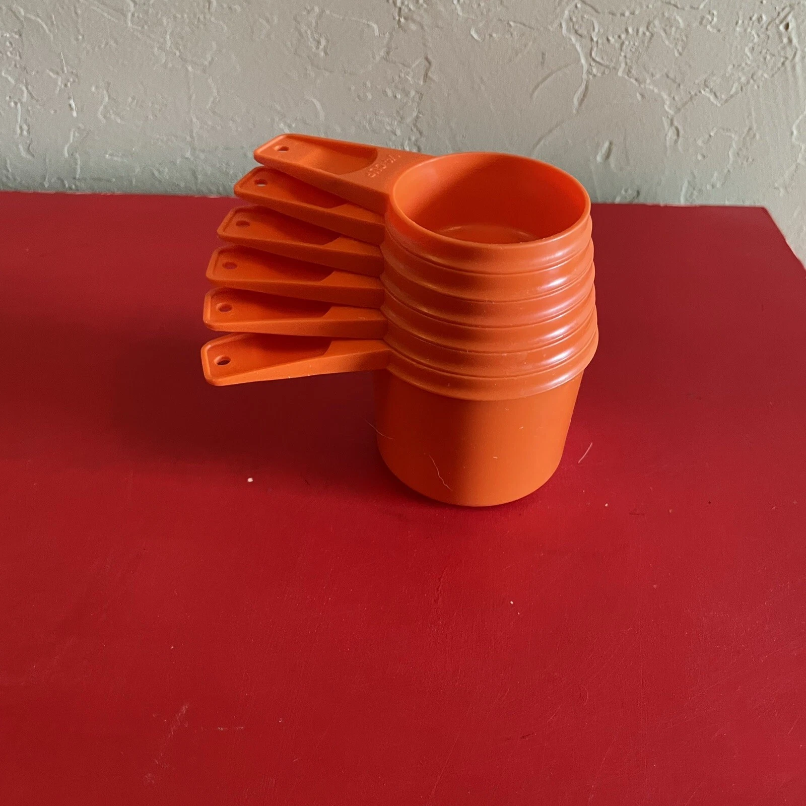VINTAGE TUPPERWARE ORANGE MEASURING CUPS COMPLETE SET 6