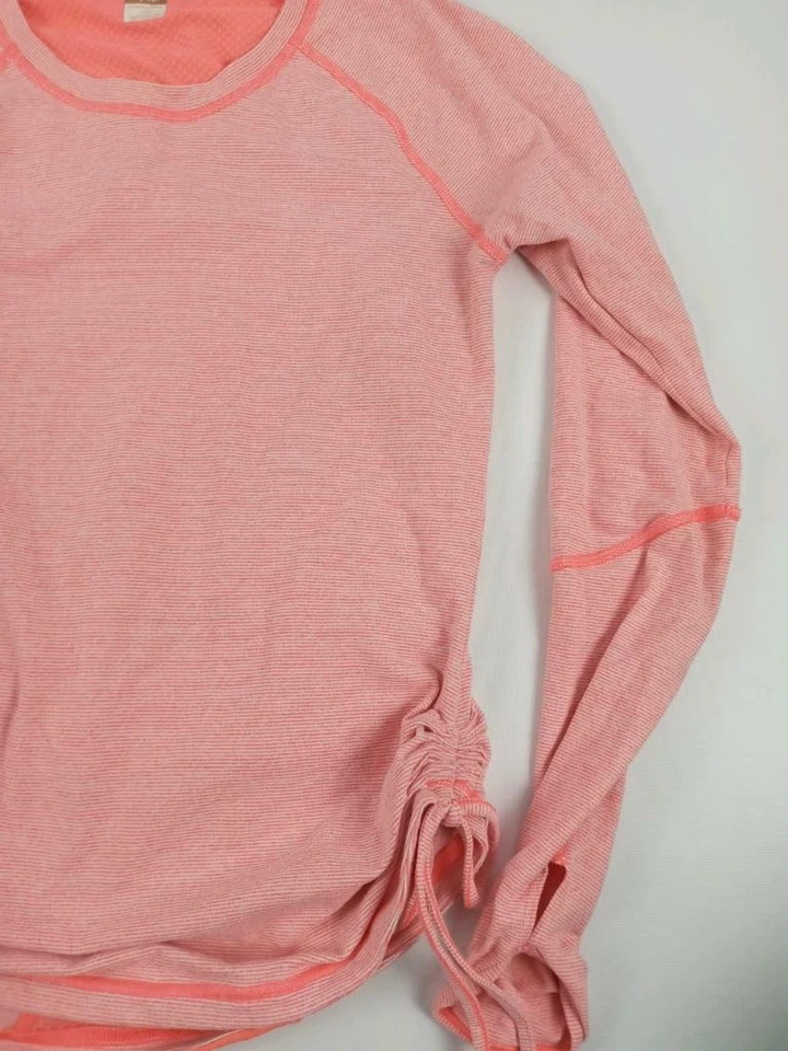 Top Lucy Athleisure para mujer talla XS naranja ventilado manga larga Tech Top Foto 3 de 4