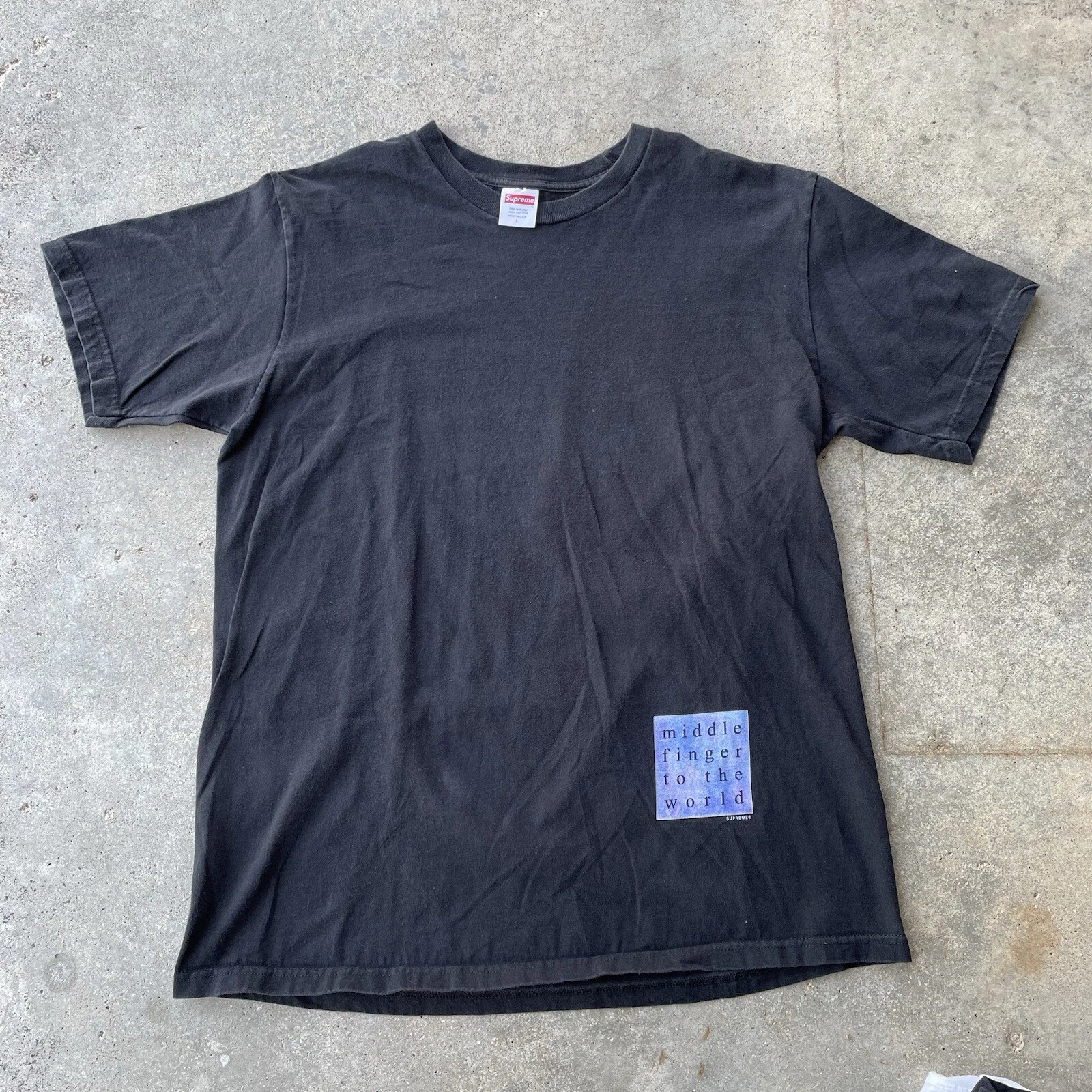 T shirt noir homme SUPREME « Middle Finger to the World » taille L fabriqué aux États Unis