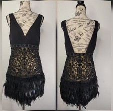 Vintage Sue Wong black mini dress with feather trim on the bottom. Never worn.
