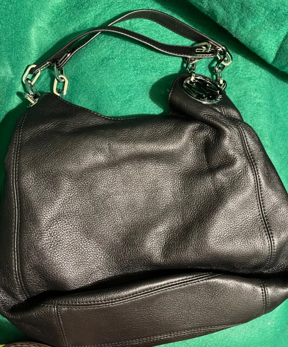 Michael kors black top and silver handbag