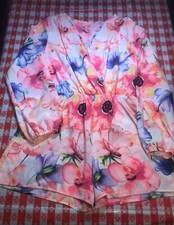 Womens short jumpsuit with no tags measures to be a medium