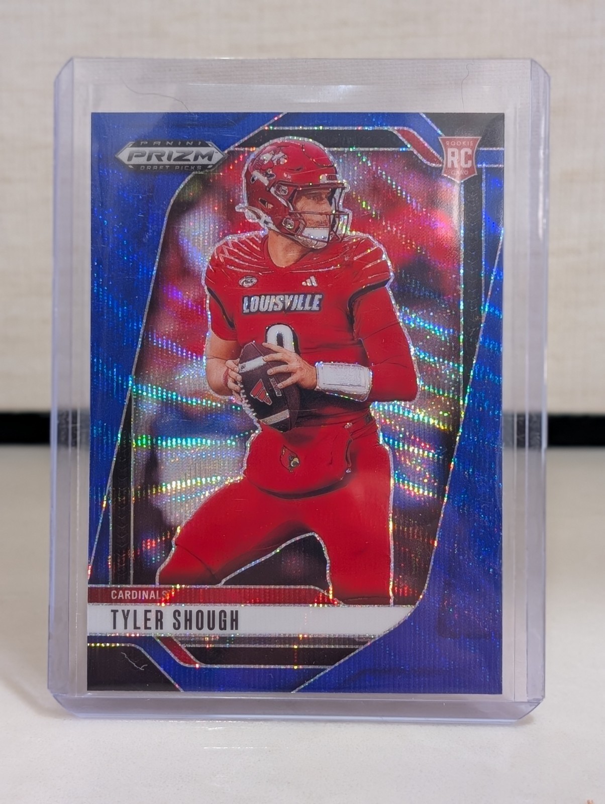 2025 Prizm Draft Picks: #49 Tyler Shough RC Blue Wave Prizm /299 - Saints Rookie