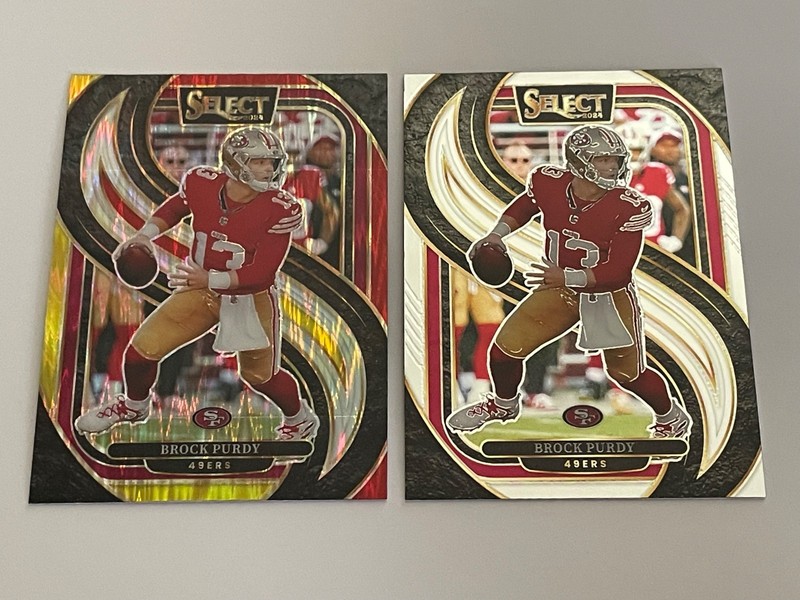 (2) 2024 Select Premier Level Brock Purdy #124 Red & Yellow Shock Prizm + Base