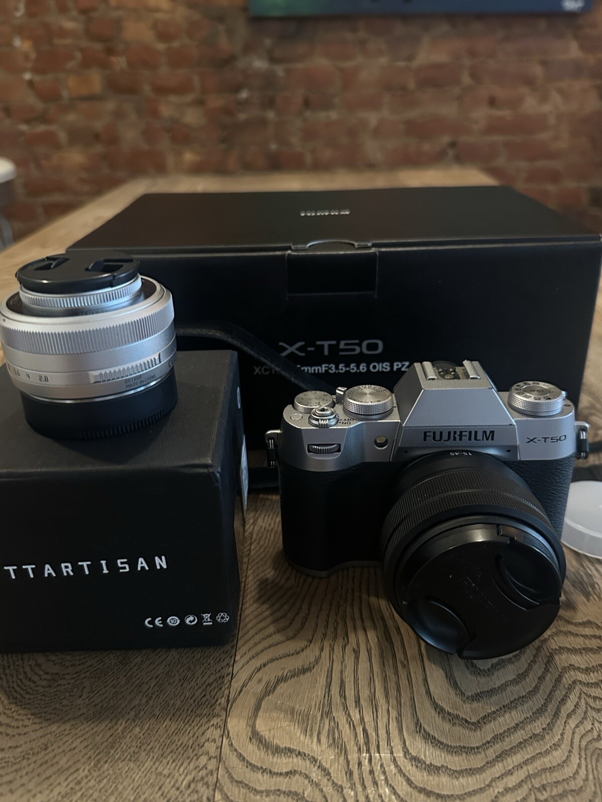Silver Fujifilm X-t50 With Fujifilm xc15-44mm Lens  and TTArtisan AFmmf2.8 Lens