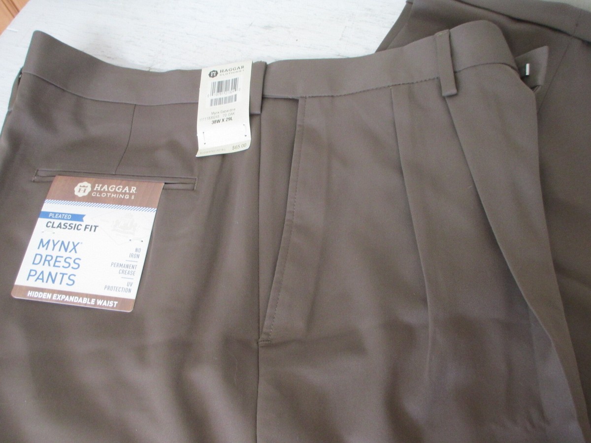 haggar mynx pleated no iron dress pants Haggar mens Mynx Gabardine Hidden Expandable Waistband Classic Fit Front Pleated Dress Pant