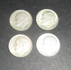 Four Roosevelt Dimes. 90% Silver.  See photo for dates and details.